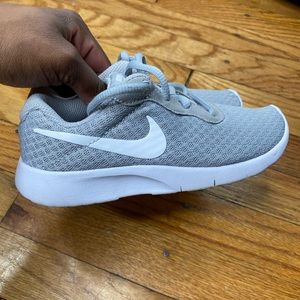 Toddler Nike grey and white running shoe